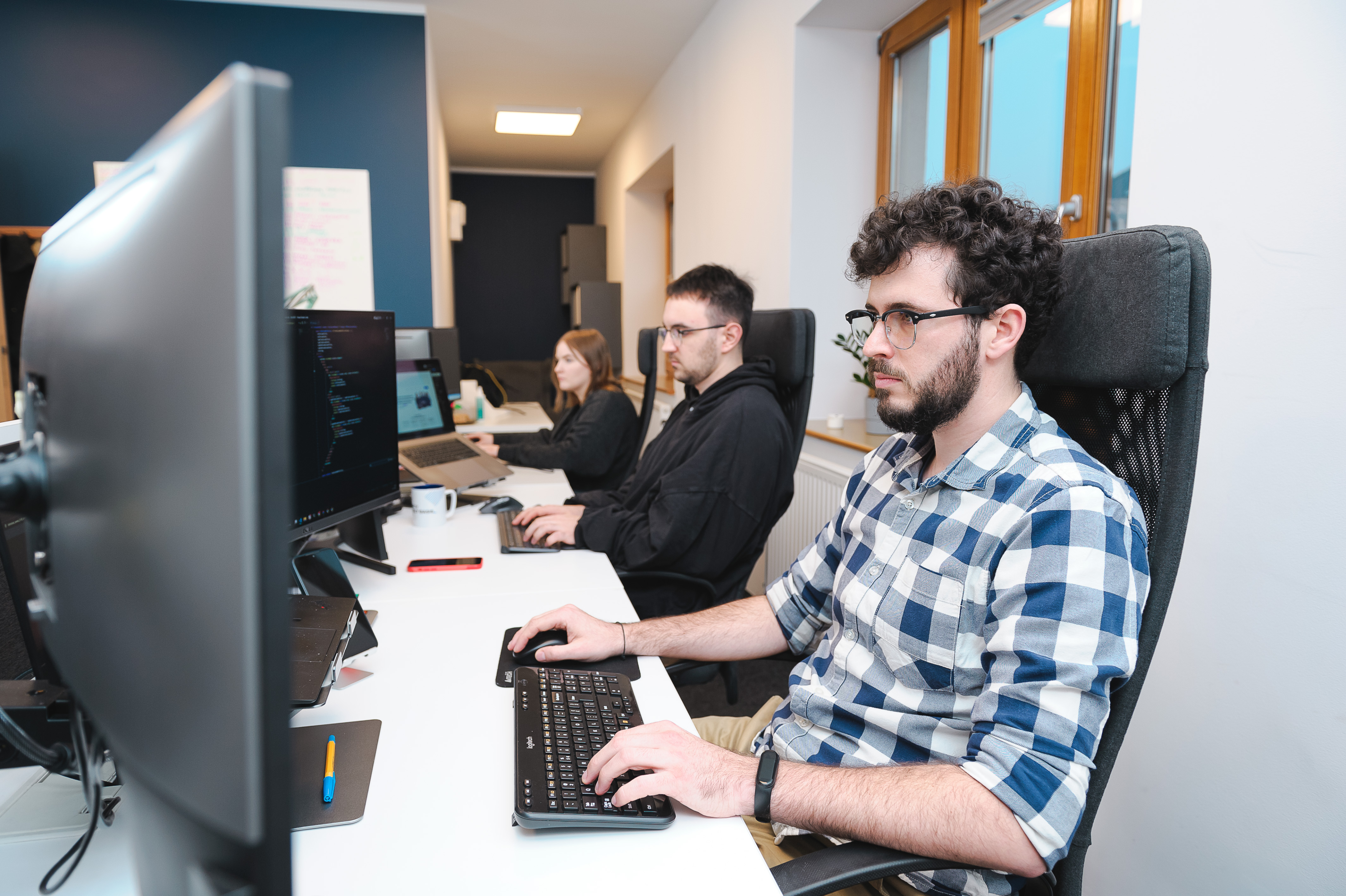 Bitnoise team working in the office