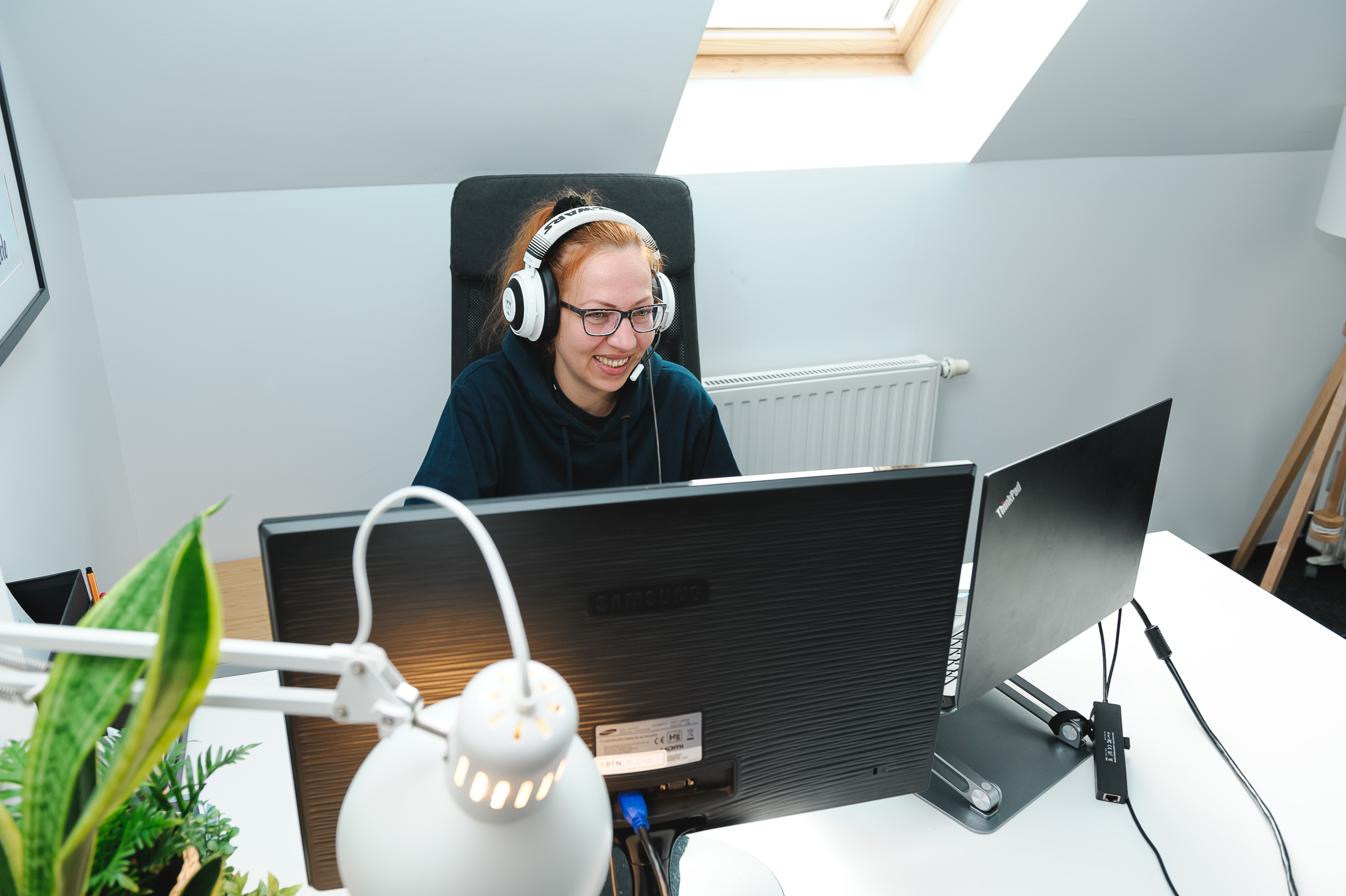 Team member working with headphones
