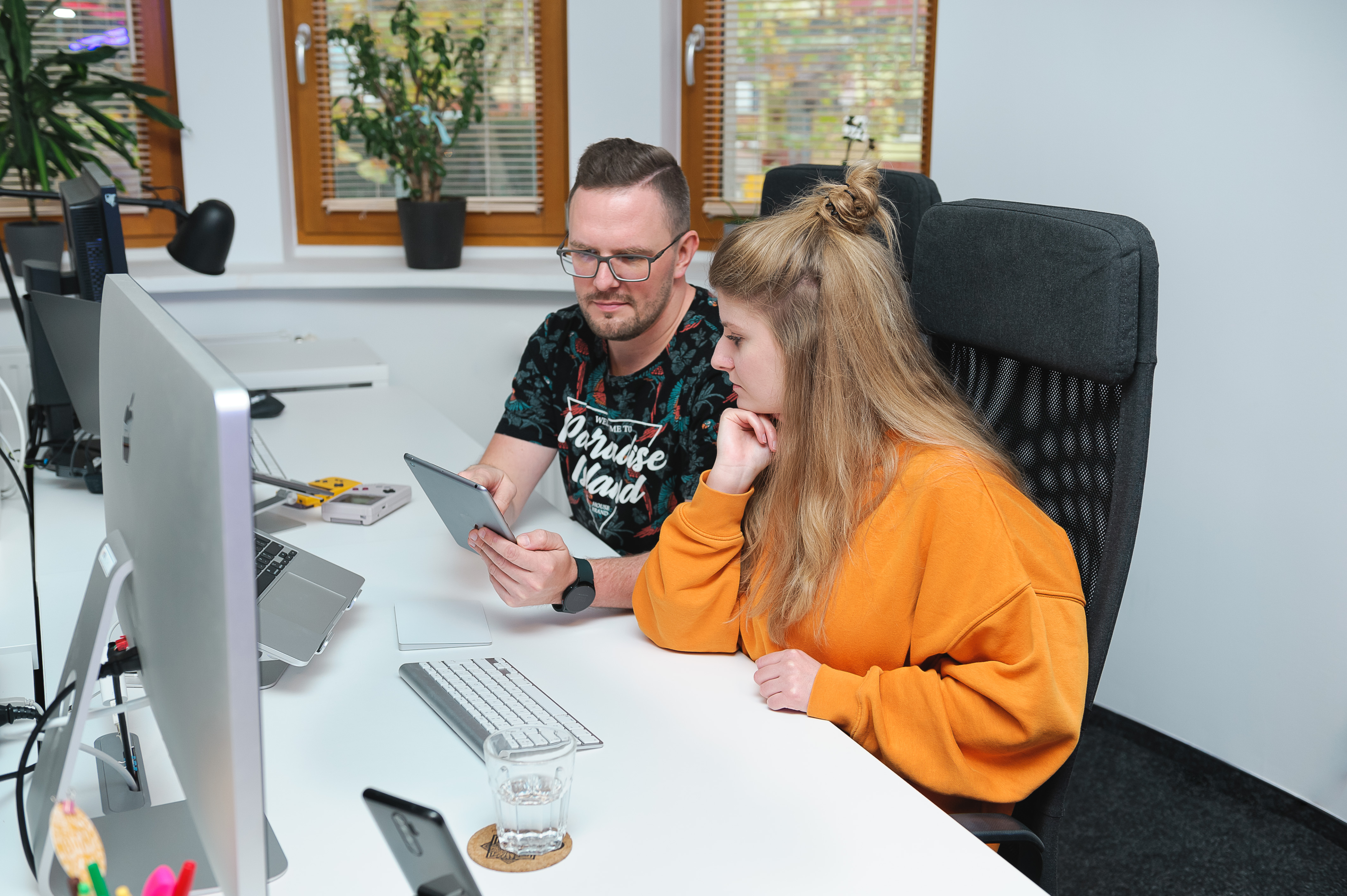 Bitnoise team members reviewing work together